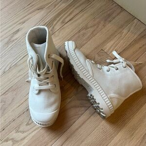 White canvas high tops